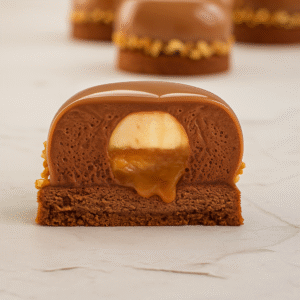 Featuring Chocolate-Tonka Mousse, Hazelnut Praliné Insert, Cacao Breton Shortbread & Mirror Glaze