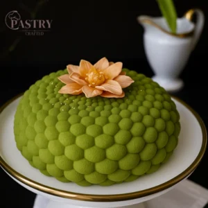 This luxurious pistachio-orange cake combines Middle Eastern kunafa crunch, orange namelaka, and matcha pistachio mousse in an unforgettable Dubai-style dessert.